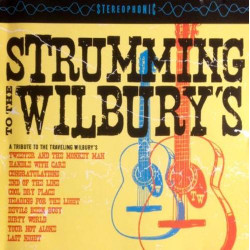 Strumming To The Wilbury's